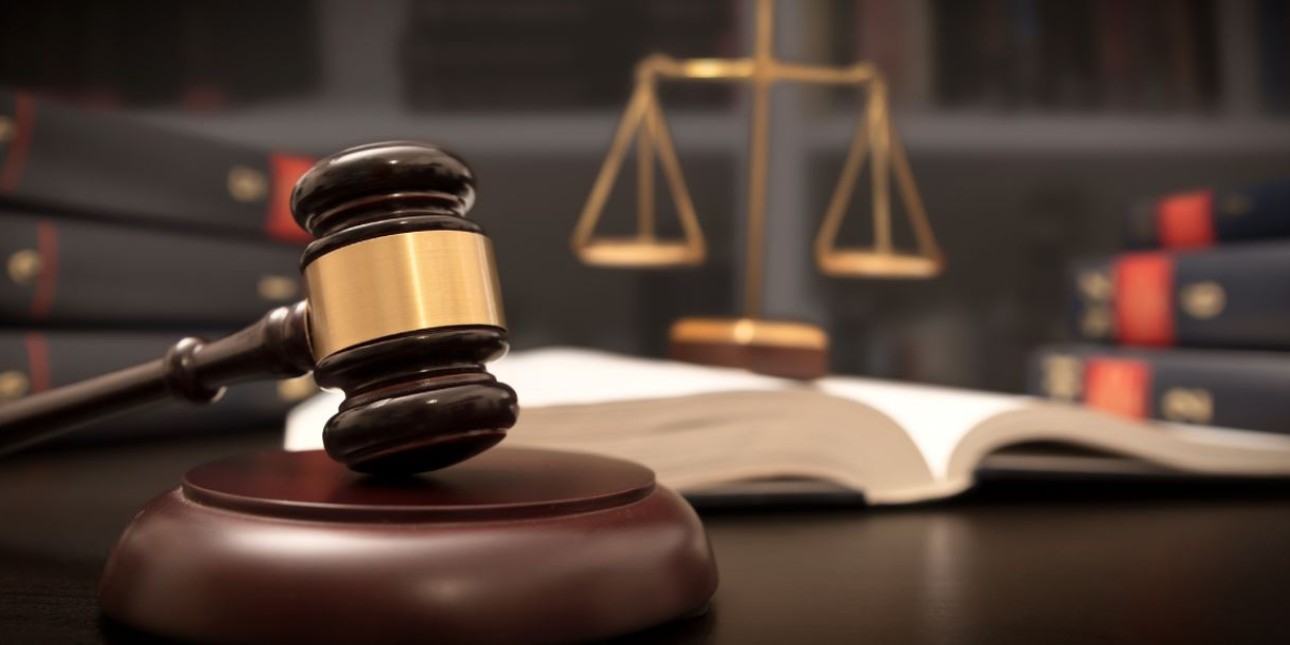 gavel and scales of justice on a desk