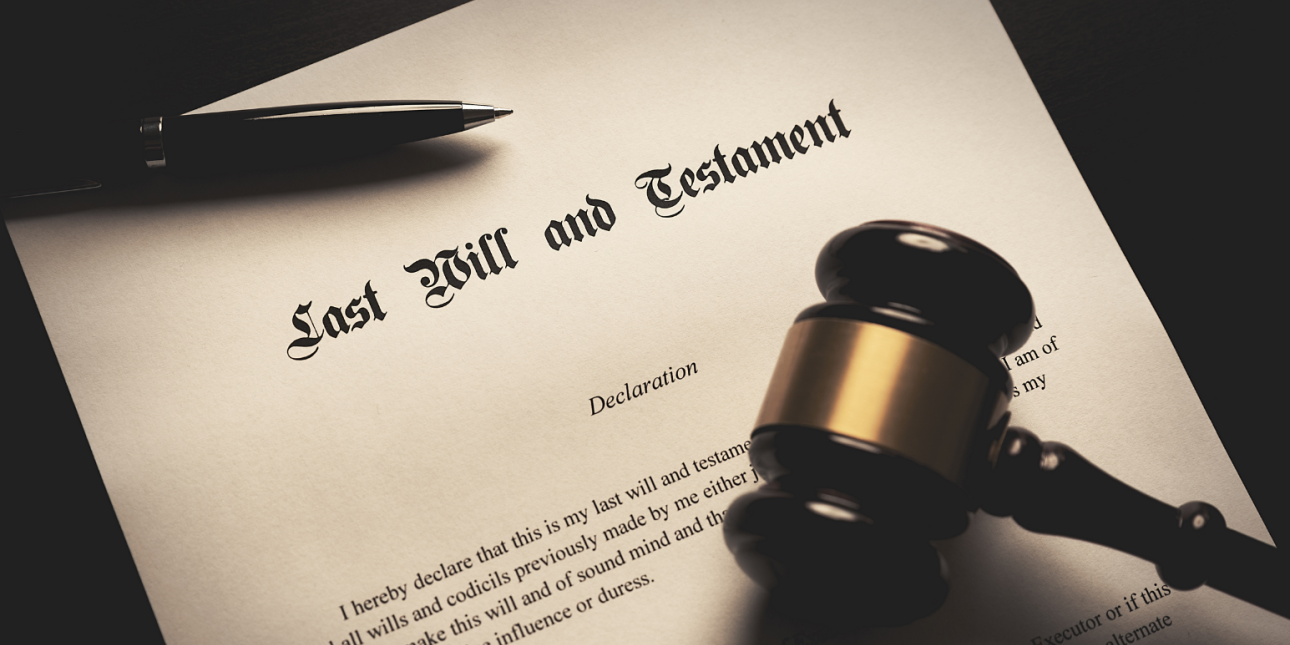 gavel and pen sitting on top of a document titled Last Will and Testament
