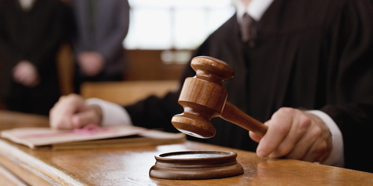 Judge wielding a mallet