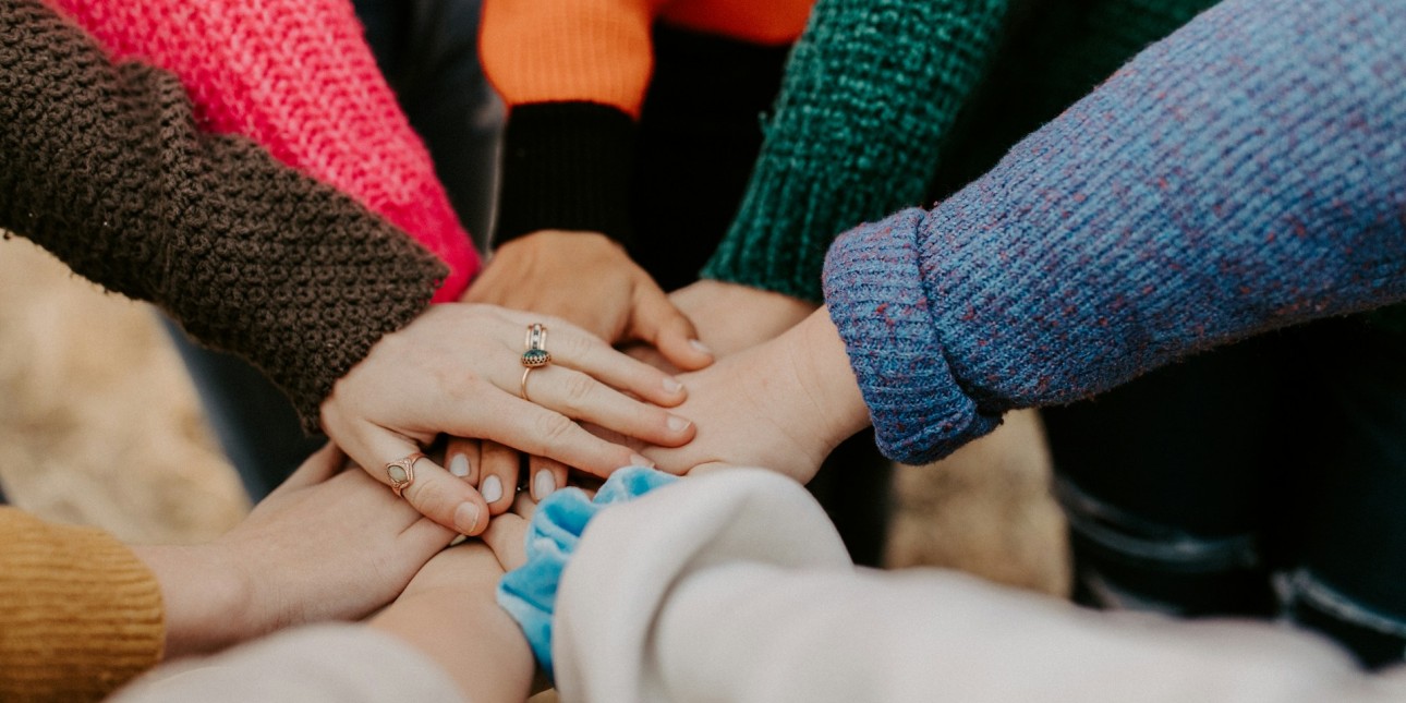 A photo of hands touching
