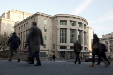 People walk by the Pennsylvania Judicial Center Tuesday, Dec. 8, 2015, at the state Capitol in Harrisburg. (Matt Rourke/AP Photo)